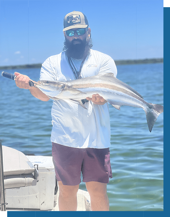 Wayne Holding a Cobia Fish