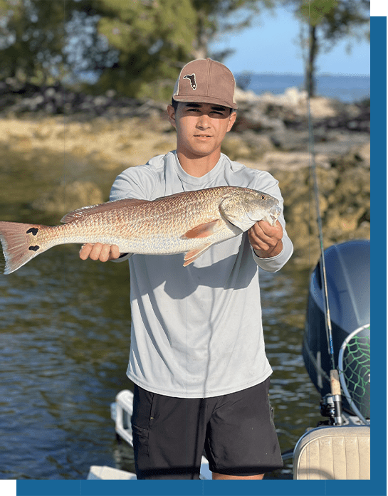 Vance Holding a Redfish