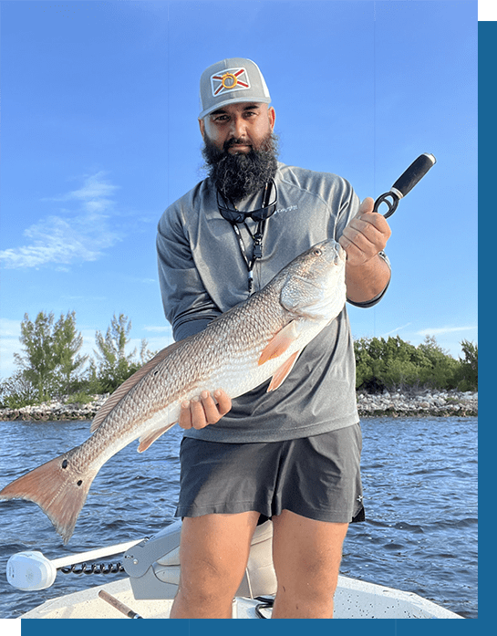 Wayne Holding a Redfish